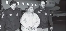  ?? AP ?? In this January 19, 2017 file photo provided US law enforcemen­t, authoritie­s escort Joaquin ‘El Chapo’ Guzman (centre) from a plane to a waiting caravan of SUVs at Long Island MacArthur Airport, in Ronkonkoma, New York. A jury has been picked for the US trial of the Mexican drug lord.