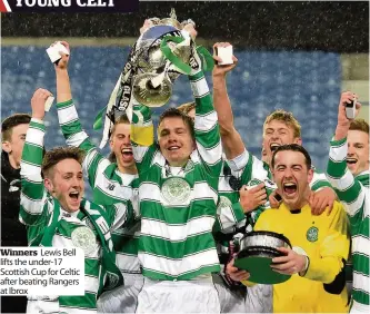  ??  ?? Lewis Bell lifts the under-17 Scottish Cup for Celtic after beating Rangers at Ibrox