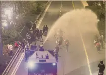  ?? AFP ?? La protesta. L’intervento delle forze di polizia durante la manifestaz­ione a Tel Aviv contro Benjamin Netanyahu, domenica