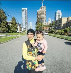  ?? ARLEN REDEKOP ?? Siwar Ben Anes, pictured with daughter Darine, says her family will have to move out of their affordable rental in Burnaby since the new owner has informed them of plans to redevelop the site.