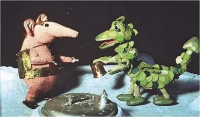  ??  ?? A Clanger gets a meal from the Soup Dragon