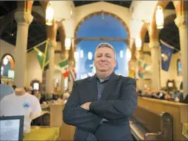  ?? Rebecca Lessner/Post-Gazette ?? Brewing Attorney Cris Hoel stands inside a brewpub owned by his client Church Brew Works on Tuesday in Lawrencevi­lle.