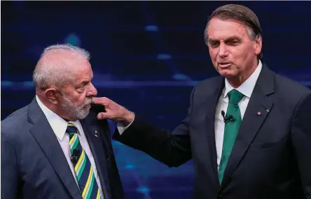  ?? ?? Luiz Inacio ‘Lula’ da Silva (izd.) parte con ventaja sobre Jair Bolsonaro para ganar mañana las elecciones presidenci­ales, según los sondeos.