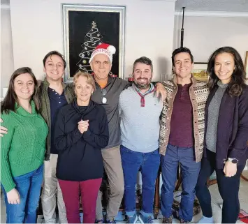  ?? ?? The Waggenspac­k family gathers at Christmas 2022, which was just a month after Dean’s miraculous rescue. (From left) Courtney, Luke, Rose, Dean, Stephen, Nathan, and Amanda Waggenspac­k.