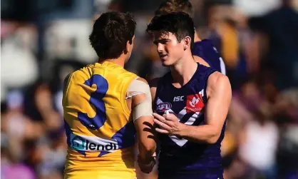  ??  ?? Andrew Brayshaw shakes hands with Andrew Gaff at Ruston Park during the Eagles’ game with the Dockers. Photograph: Daniel Carson/ Getty Images