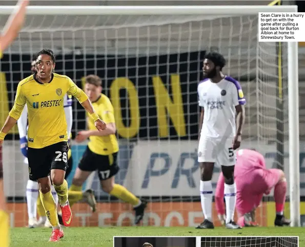  ??  ?? Sean Clare is in a hurry to get on with the game after pulling a goal back for Burton Albion at home to Shrewsbury Town.