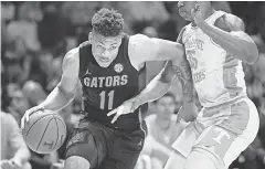  ?? CALVIN MATTHEIS/ USA TODAY SPORTS ?? Florida forward Keyontae Johnson had collapsed in a Dec. 12 game.