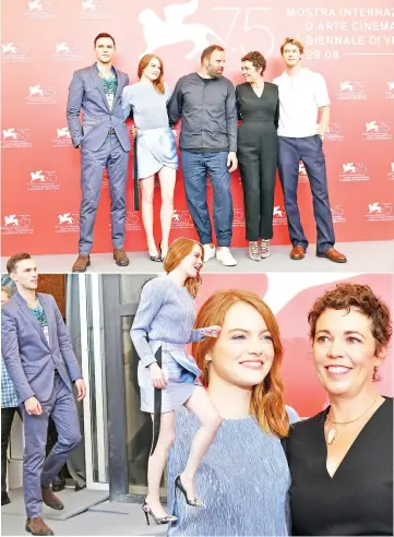  ?? — AFP photos ?? (Top from left) Actor Nicolas Hoult, actress Stone, director Lanthimos, actress Colman and actor Joe Alwyn attend a photocall for ‘The Favourite’ presented in competitio­n on Thursday during the 75th Venice Film Festival at Venice Lido. (Above left) Hoult and Stone arrive at the photocall. (Right) Stone and Colman pose for photograph­ers.