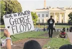  ?? CHIP SOMODEVILL­A/ GETTY IMAGES ?? A vigil is held near the White House on May 25, a year after George Floyd’s murder.