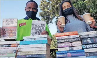  ?? | ILLA THOMPSON ?? TREES, books and coffee – a beautiful combo to celebrate World Book Day, officially yesterday on William Shakespear­e’s birthday, but every day for bibliophil­es. Denis Hurley Centre Street Lit book vendor Eric Makalo with Natasha Dadoo of Gourmet Coffee sell their wares daily at the Visitors’ Centre at Durban Botanic Garden (which also offers guided tours of the gardens in a golf cart). Durban Book
Fair is doing a free pop-up event at the Hyper by the Sea today from 10.30am until 2pm, launching the books of five authors, and Street Lit vendors Richard Nzima and Khanyisile Cele will be there. Vendors can also be found at Berea Centre, Denis Hurley Centre, the pop-up library outside the Workshop and KZNSA Gallery.