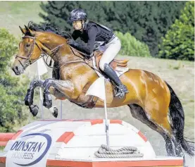  ?? Photo / Libby Law Photograph­y ?? Taupō eventer Monica Spencer in action on Artist at the 2022 Randlab Matamata Horse Trials in February.