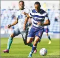  ??  ?? CHALLENGE: Reading’s Jordan Obita and Rovers’ Elliott Bennett