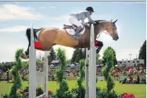  ?? ASHLEY FRASER ?? Beth Underhill, riding Count Me, won the $100,000 CSI2 Classic at Ottawa Internatio­nal Horse Show at Wesley Clover Parks Sunday.