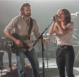  ?? NEAL PRESTON/WARNER BROS. ?? Bradley Cooper and Lady Gaga are getting comfortabl­e and remaking a Hollywood classic with “A Star Is Born.”