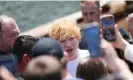  ?? Photograph: thecelebri­tyfinder/ Bauer-Griffin/GC Images ?? ‘I’m speccy, ginger hair, really short, English. That guy doesn’t become a pop star’ … Sheeran surrounded by fans in Los Angeles, May 2023.