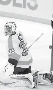  ?? LYNNE SLADKY/AP ?? The puck gets past Flyers goaltender Martin Jones on a gamewinnin­g goal scored by Panthers defenseman Aaron Ekblad in overtime Wednesday in Sunrise, Fla.