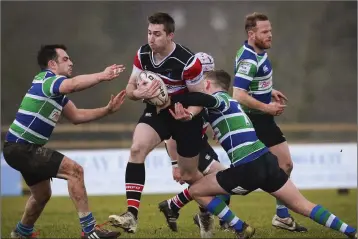  ??  ?? Wicklow’s Ben Porter bursts past Gorey’s Stephen Duke during the J1 League in Ashtown Lane, Wicklow. Photos: Garry O’Neill