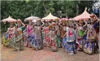  ?? — AP ?? Women in festive outfits practice Garba ahead of Navratri in Ahmedabad on Sunday.