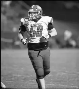  ??  ?? Photo courtesy jaysphotod­esign.com
Glen Rose lineman Andrew Weatherfor­d runs out on the field during a recent Beavers game.