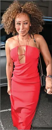  ?? ?? NOT SO SCARY: Fellow Spice Girl Mel B arrived wearing a revealing red outfit