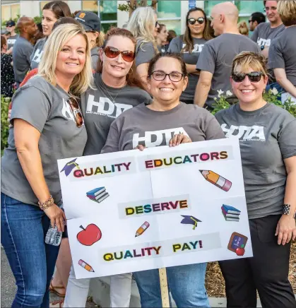  ?? Cory Rubin/The Signal ?? Hart District teachers stand outside the Hart District Headquarte­rs in Santa Clarita on Wednesday.