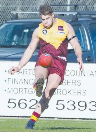  ??  ?? Drouin forward Michael Theodoridi­s was superb against Moe on Saturday kicking five goals and having a hand in a few others.