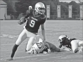  ?? Kevin Myrick / Standard Journal ?? Quarterbac­k Trevon Wofford gets a big block and finds a lane to run for a first down against LaGrange.