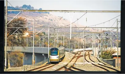  ?? Picture: Bloomberg ?? GETTING BACK ON TRACK. M&R’s model is forecastin­g that Gautrain ridership levels will increase and return to a level where the patronage guarantee applies in 2023.