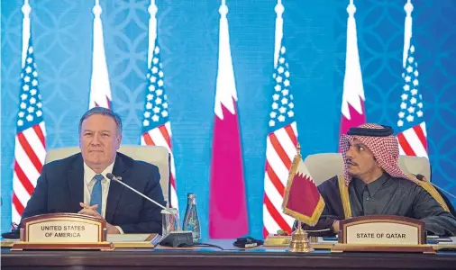  ??  ?? ALLIES: Mike Pompeo signed a memorandum of understand­ing about a vital US military base with Qatar’s deputy prime minister