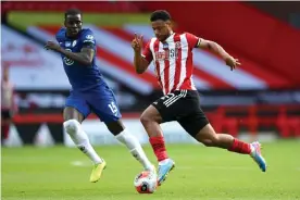  ??  ?? Lys Mousset, here in action for Sheffield United against Chelsea last season, has not played this season but his return to fitness is a big boost for Chris Wilder. Photograph: Shaun Botterill/Getty Images