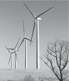  ?? [PHOTO BY PAUL HELLSTERN, THE OKLAHOMAN ARCHIVES] ?? The Minco II wind farm southwest of Minco supplies energy for Google’s Oklahoma servers.