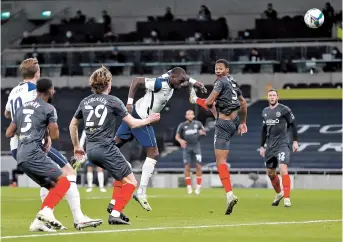  ??  ?? Tottenham Hotspur’s Moussa Sissoko scores the first goal against Brentford in the English League Cup semifinal at Tottenham Hotspur Stadium, London, on Tuesday. Son Heung- min also scored as Spurs reached the final with a 2- 0 win. — Reuters