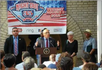  ?? PHOTOS BY PENNY RAY ?? Mayor Reed Gusciora addresses citizens at the NNO kickoff event at City Hall. He’s joined by Acting Police Director Pedro Medina (far left), Councilwom­an Kathy McBride (behind Gusciora), Councilwom­an Marge Caldwell-Wilson (right) and Councilman...