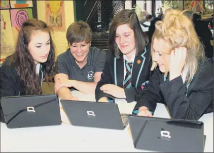  ??  ?? LEARNING: Ormiston Bushfield students learn about university life (left to right) Taylor Heffernan (14), Jasmine Studholme (15) and Ellie Griffiths (15) with Rachel Coe from Anglia Ruskin University.