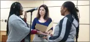  ?? EVAN BRANDT — MEDIANEWS GROUP ?? Councilwom­an Trenita Lindsay, left, takes the oath of office Monday.