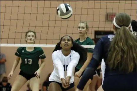  ?? RANDY MEYERS — THE MORNING JOURNAL ?? Lorain’s Sydney Patterson, pictured during the Lorain County volleyball preview on Aug. 10, is one of two returning players from the Titans’ 2017 Lake Erie League championsh­ip team.