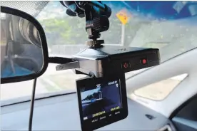  ?? STEPHEN CHRISTIAN THE CANADIAN PRESS ?? Dashcams are being praised as protection while driving.