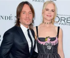  ??  ?? Keith Urban with Nicole Kidman, who was honoured at the event
