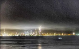  ??  ?? Panoramic view of Kuwait City at night. (Bassam Asad – KUNA)