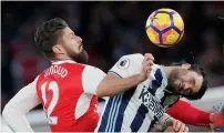  ?? AP ?? Olivier Giroud vies for the ball with West Brom’s Claudio Yacob during a Premier League match. —