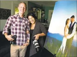  ??  ?? WEDDING PHOTOGRAPH­ERS Andrew and Melanie Mishler of Penn Valley said they have lost $100,000 due to couples rescheduli­ng amid the pandemic.