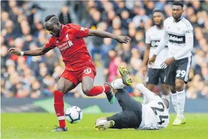  ?? Photo / AP ?? Sadio Mane has scored 11 goals in his last 11 games for Liverpool.