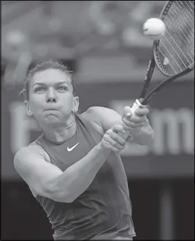  ?? AP PHOTO ?? Romania’s Simona at Roland Garros. Halep defeated Taylor Townsend to reach the third round