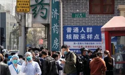  ?? Photograph: China Daily/Reuters ?? Residents line up outside a nucleic acid testing site of a hospital in Shanghai.