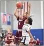  ?? MIKE CABREY/MEDIANEWS GROUP ?? Abington’s Maya Johnson (2) puts up a shot against Plymouth Whitemarsh during a Distrct 1-6A playback on Feb. 25.
