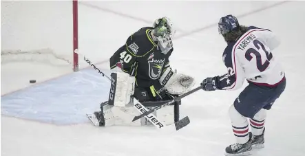  ?? GREG SOUTHAM ?? A shot from Nolan Yaremko of the Tri-City Americans beats Edmonton Oil Kings goaltender Travis Child Friday night at Rogers Place. Yaremko scored a pair as the Americans won 5-0.