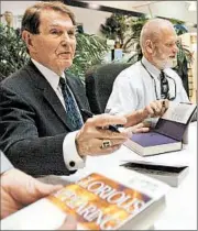  ?? SHANE BEVEL/(SHREVEPORT, LA.) TIMES ?? Authors Tim LaHaye, left, and Jerry B. Jenkins sign copies of their “Glorious Appearing” book in 2004.