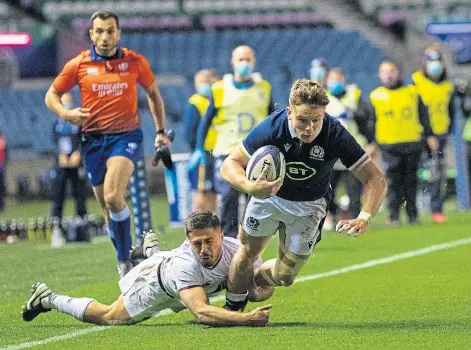  ??  ?? WINNER: Scotland’s Darcy Graham being tackled during the Autumn Test match win over Georgia at BT Murrayfiel­d.
