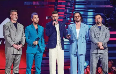  ?? THEO WARGO/GETTY IMAGES FOR MTV/TNS ?? From left, Joey Fatone, Lance Bass, Justin Timberlake, JC Chasez and Chris Kirkpatric­k of NSYNC speak onstage during the 2023 MTV Video Music Awards at Prudential Center on Sept. 12, 2023, in Newark, New Jersey.