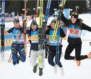  ?? | PHOTO : EPA ?? Julia Simon, Justine Braisaz-Bouchet, Sophie Chauveau et Lou Jeanmonnot, les nouvelles championne­s du monde du relais sont Françaises